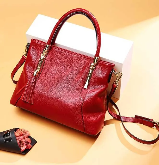 Designer-Autumn and winter new style leather fashion fringed top leather large bag with one shoulder inclined handbag