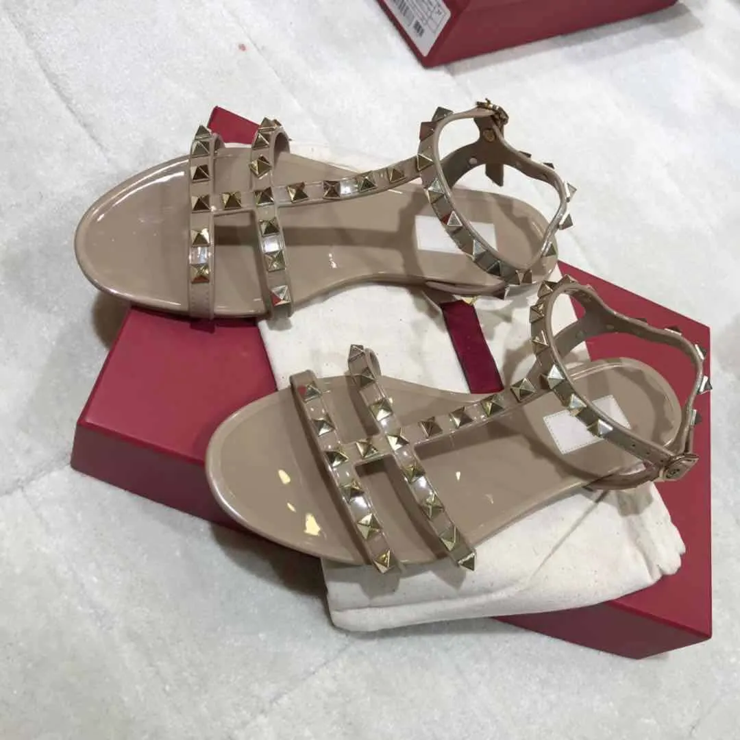 Hot koop-mode luxe vrouw designer sandalen klinknagels grote strik zomer strand sandalias femininas sandale platte jelly sandalen maat 35-40