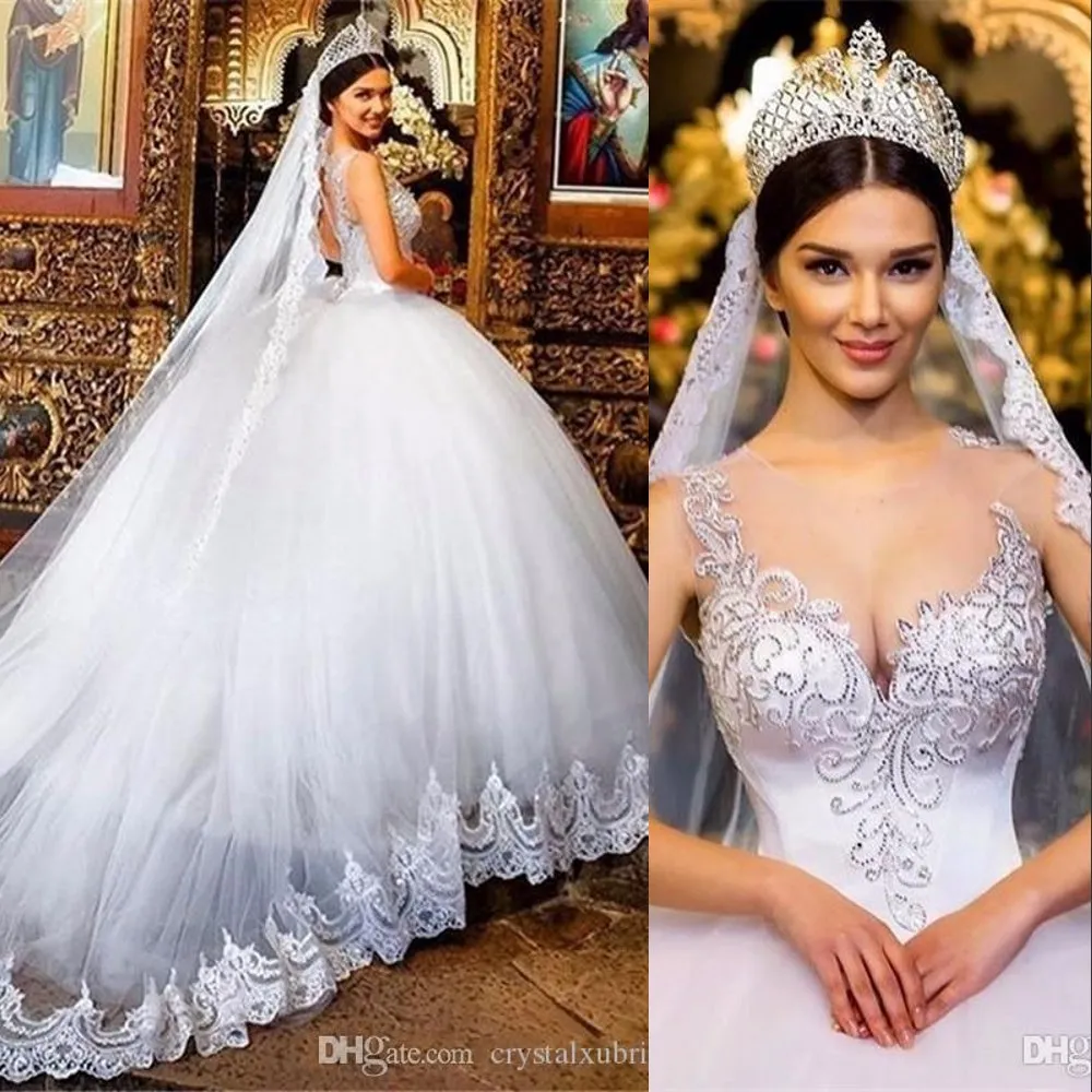 Hot Sexy Ball Gown Wedding Dresses Jewel Neck Lace Appliques Crystal Beads Illusion Hollow Back Court Train Puffy Plus Size Bridal Gowns