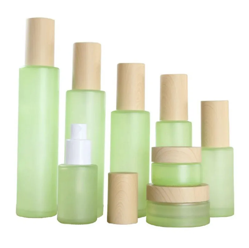 20ml 30ml 40ml 60ml 80ml 100ml 120ml Pot de crème en verre dépoli vert Brumisateur Lotion Flacon pompe avec couvercles en bois d'imitation Caps