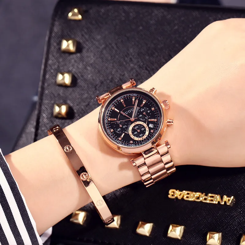 Kvinnor tittar på Elegant Brand Guou berömda lyxguldvattentäta kvartsklockor Damer Små sekunder kalenderstål armbandsur C1901217N