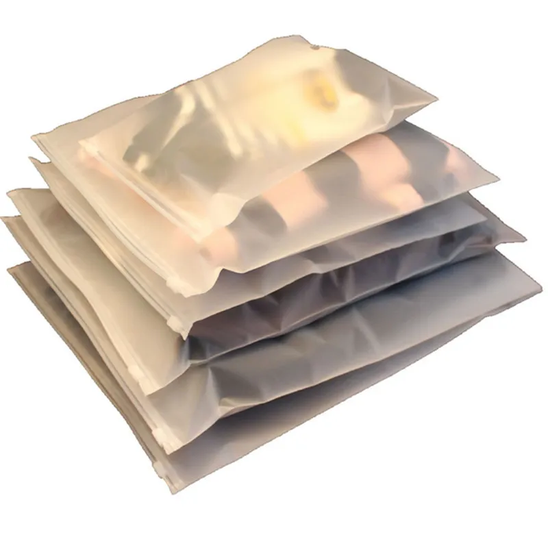 100pcs Sacs d'emballage transparent à 100 pcs 0.22mm Thincknkness Acide gravure en plastique Sacs à soi-disant Sacs de style Soufflement Soupes Sous-Vêtements Sacs Organisateur Sac 9 tailles