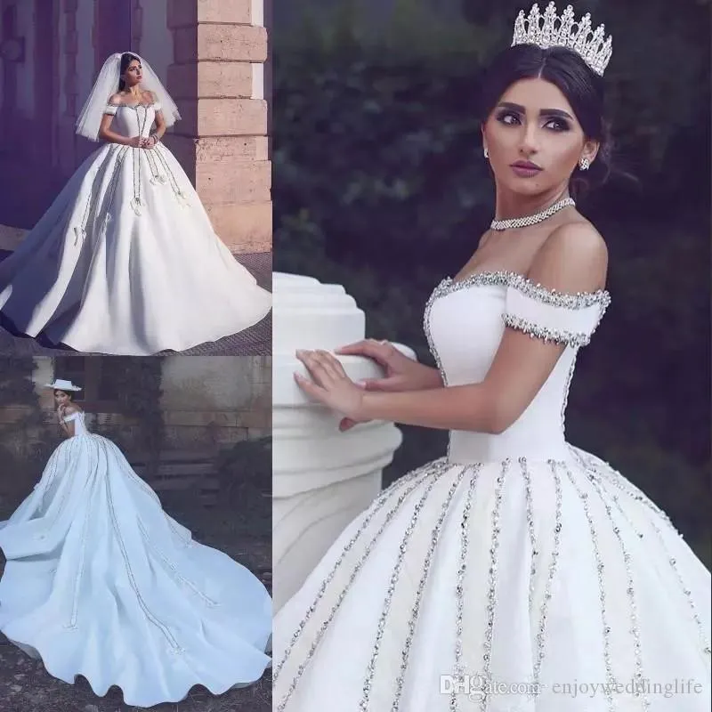 Luxury Arabic Dubai Ball Gown Wedding Dresses Off Shoulder Crystal Beading Bows Backless Cathedral Train Short Sleeve Wedding Bride Gowns