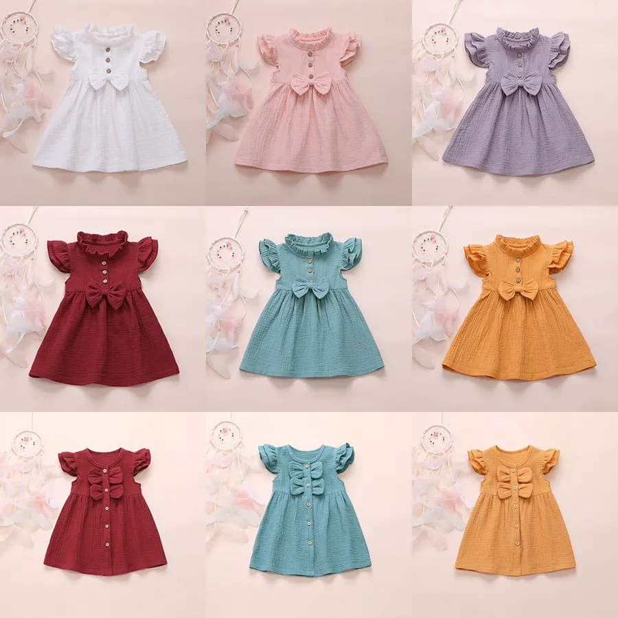 Dzieci Girls Bow Solid Sukienka Dzieci Wzburzyć Latający Rękaw Princess Sukienki Lato Bawełniana Pościel Sundress Ubrania Boutique Baby Odzież M1560