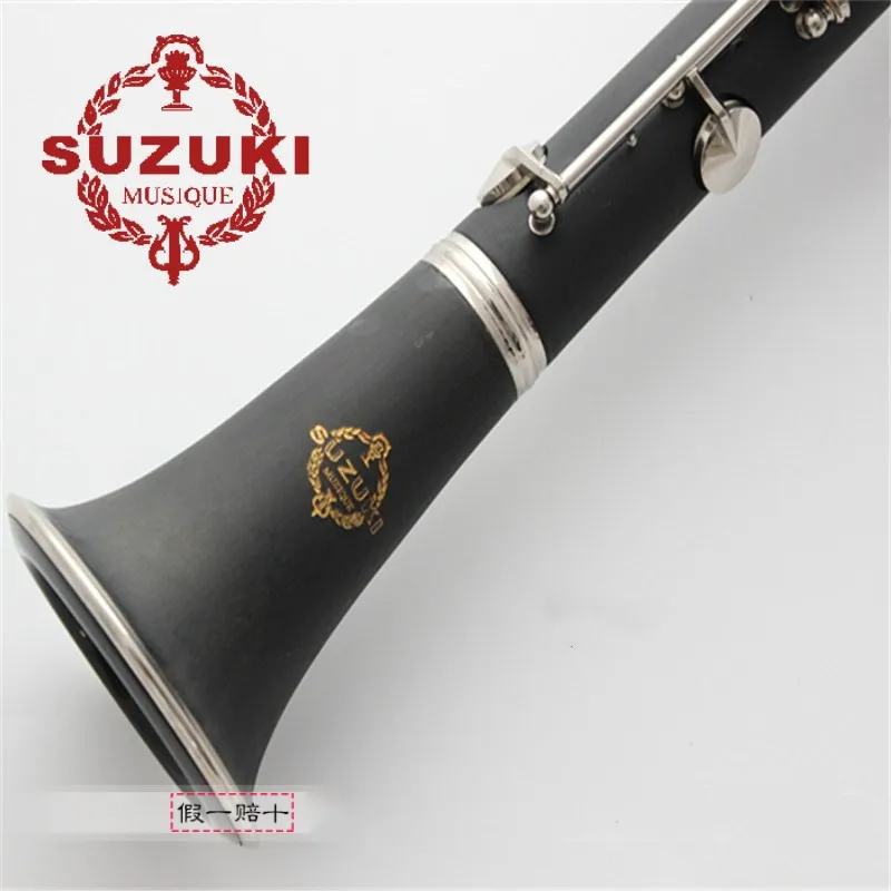 Suzuki BB Clarinet 17 clés avec accessoires de cas jouant des instruments de musique