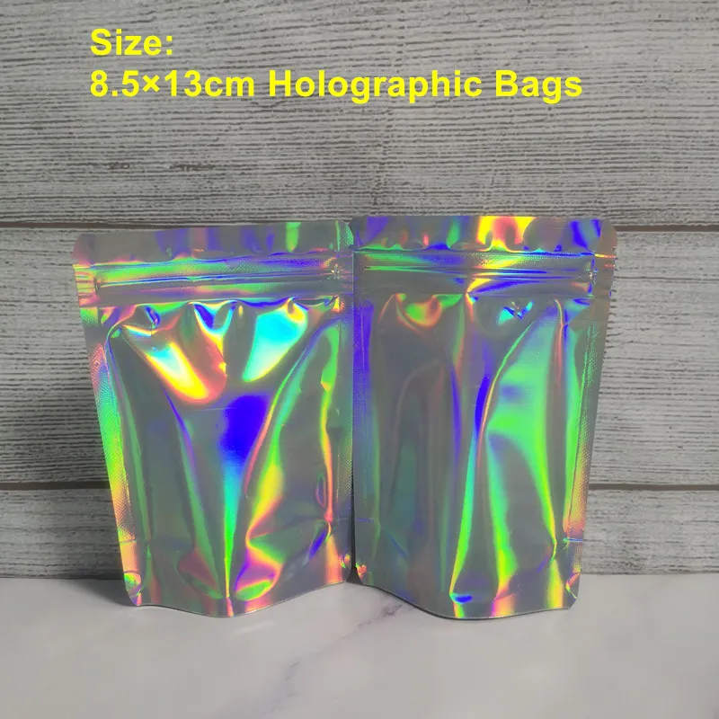 Ny ankomst 8,5x 13cm Pet Holografisk väska Tillbehör Lagringsfärg Flat Zip Lock Bags Laser Mylar Pouch Reusable Aluminium Fold Food Safe Väskor