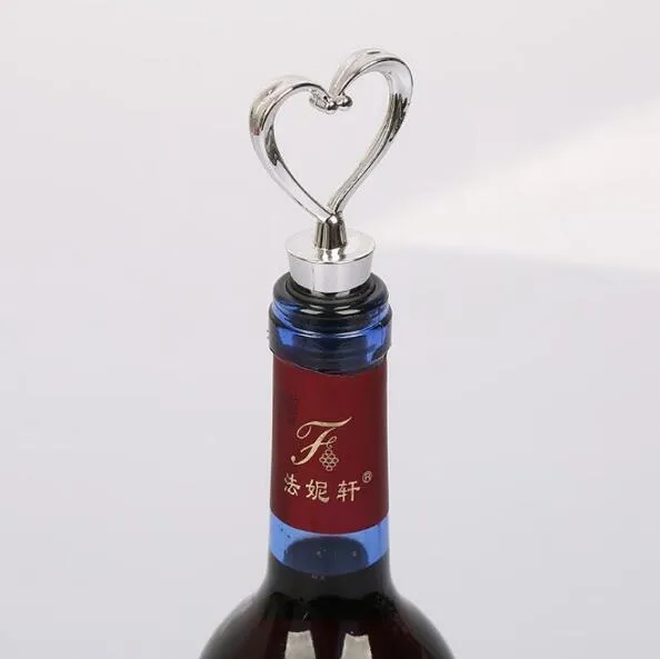 Nuovo regalo di bomboniere per bomboniere in plastica per tappi per bottiglie di vino a forma di cuore elegante Vendita calda