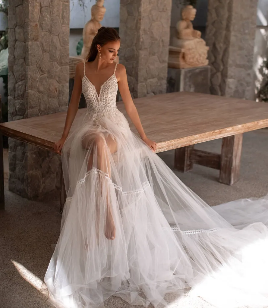Lace Backless A Line Wedding Dress With Spaghetti Straps V Neck
