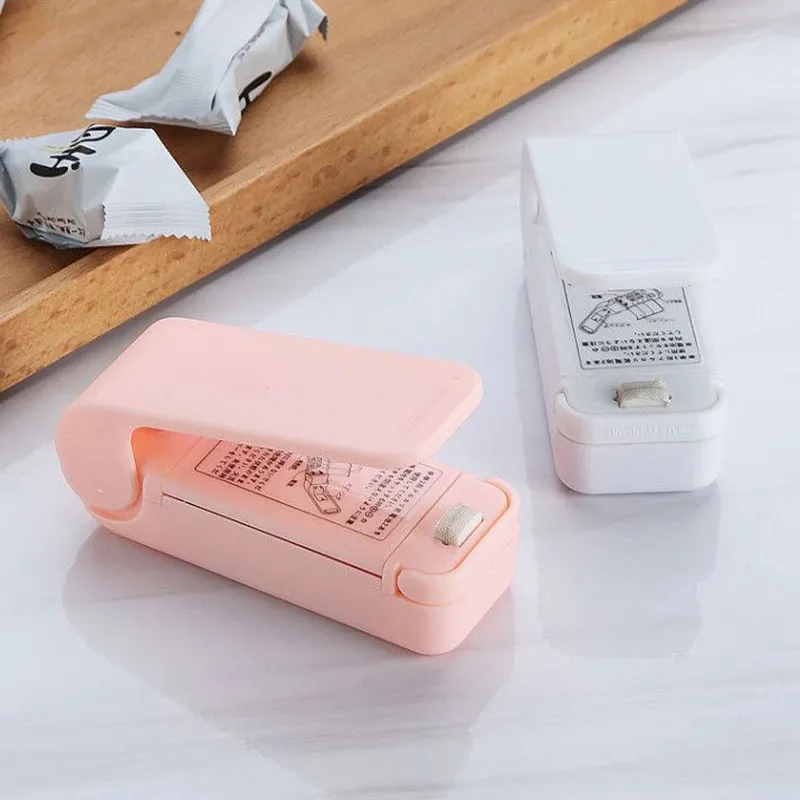 Mini termosaldatrice portatile Piccole macchine sigillatrici elettriche Sigillante a impulsi Sigillante per imballaggio Sacchetti di plastica