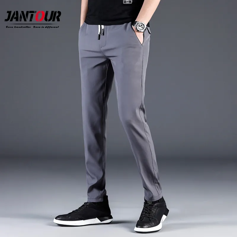 Letnie spodnie męskie Skinny Stretch koreańskie spodnie na co dzień Slim Fit Chino w pasie Jogger Dress spodnie męskie wodoodporne cienkie