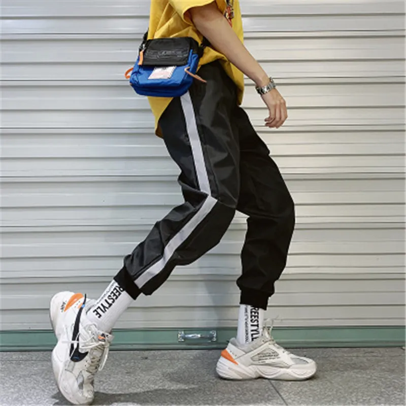 Streetwear Hip Hop Joggers 바지 남성 반사 루스 하렘 바지 발목 길이 바지 화이트 스포츠 캐주얼 스웨트 팬츠