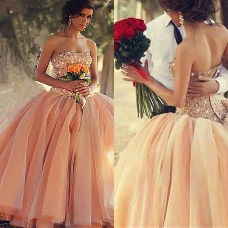 Arabisk Dubai Orange Quinceanera Klänning för 15 år Girl Ball Gown Stropless Neck Ruffled Chapel Train Quinceanera Klänning