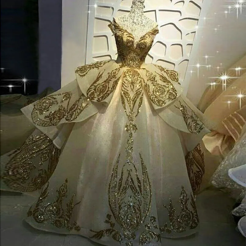 Sequined Gold Lace Gold wedding ball gown with Sheer Jewel Neckline, Appliqued Bridal Gossets, Chapel Train, and Tiered Organza - Vestidos de Novia