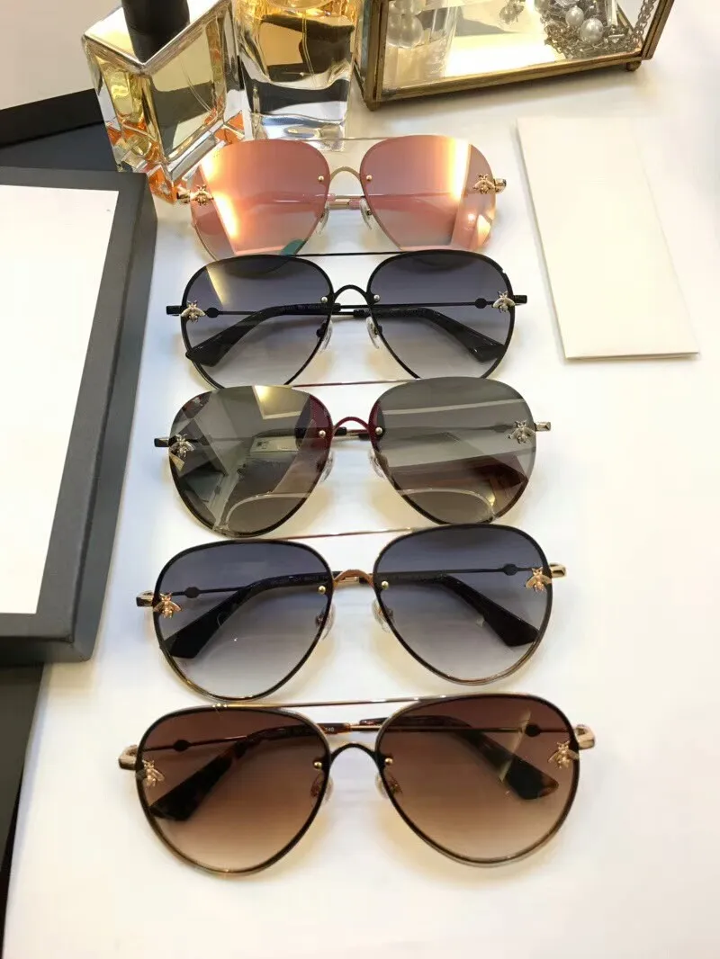 فاخر مصمم النظارات الشمسية النظارات الشمسية الفاخرة للنساء الرجال نظارات الشمس المرأة رجل العلامة التجارية مصمم طلاء أزياء النظارات الشمسية oculos دي 2201