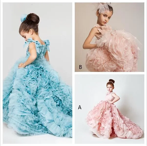 Blush Pink Girls Pageant Dresses 2019 Nuovi abiti da ballo Cascading Ruffles Designer unico Bambino Glitz Pageant Abiti da ballo con fiori fatti a mano