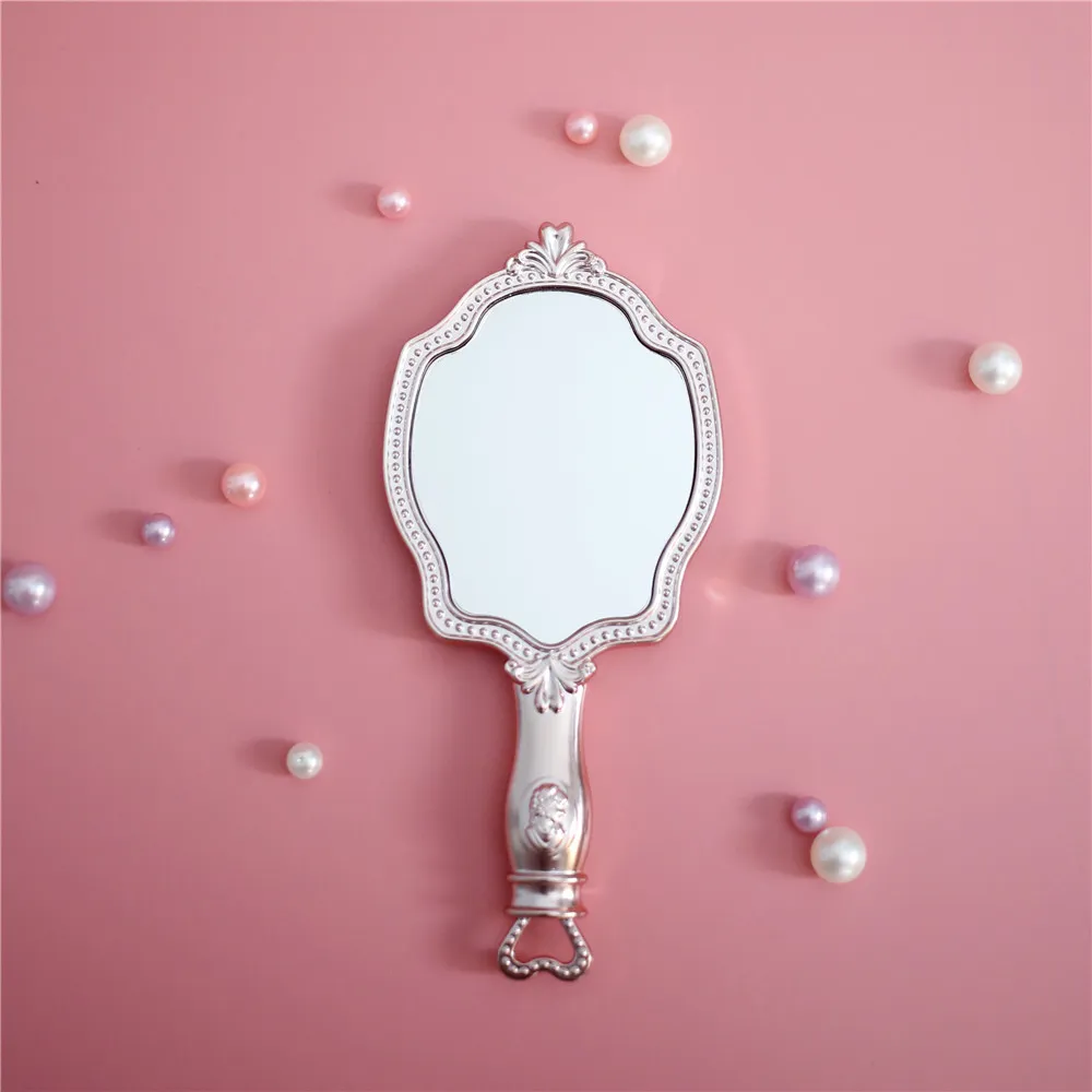 Miroir à main de maquillage Les Merveilleuses Ladurée - Miroir à main de beauté en relief de luxe de taille voyage