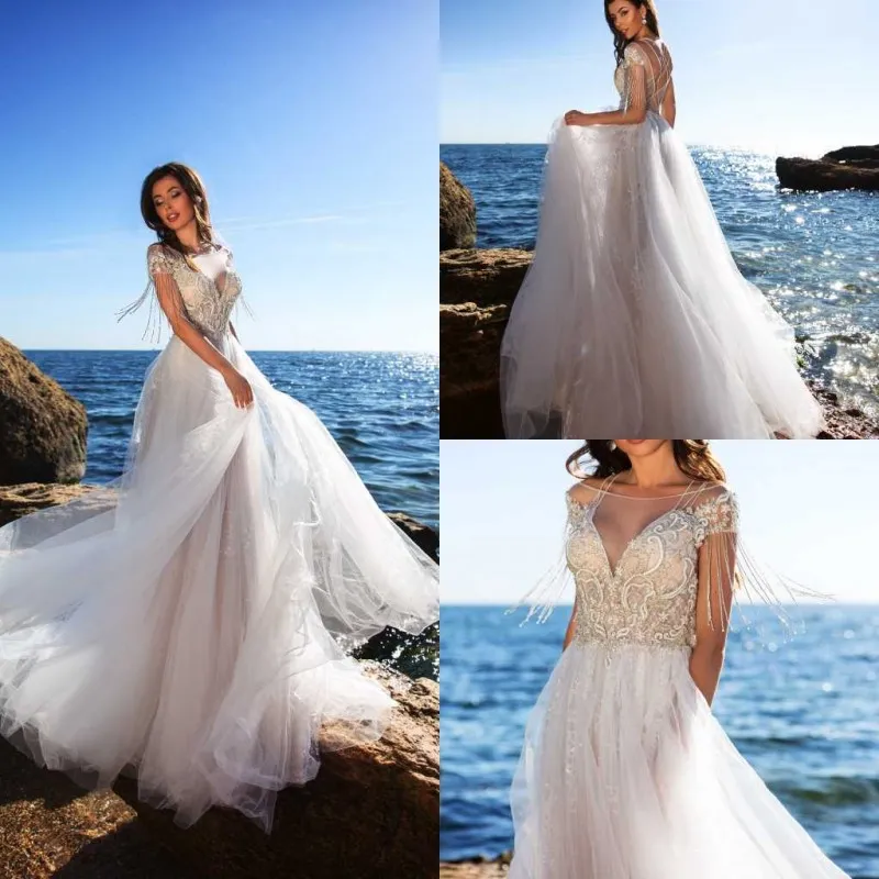 Sheer Bateau Beach Suknie ślubne Koronkowe Aplikacje Bohemia Suknie ślubne z Tassel Criss Cross Back Plus Size Wedding Sukienka