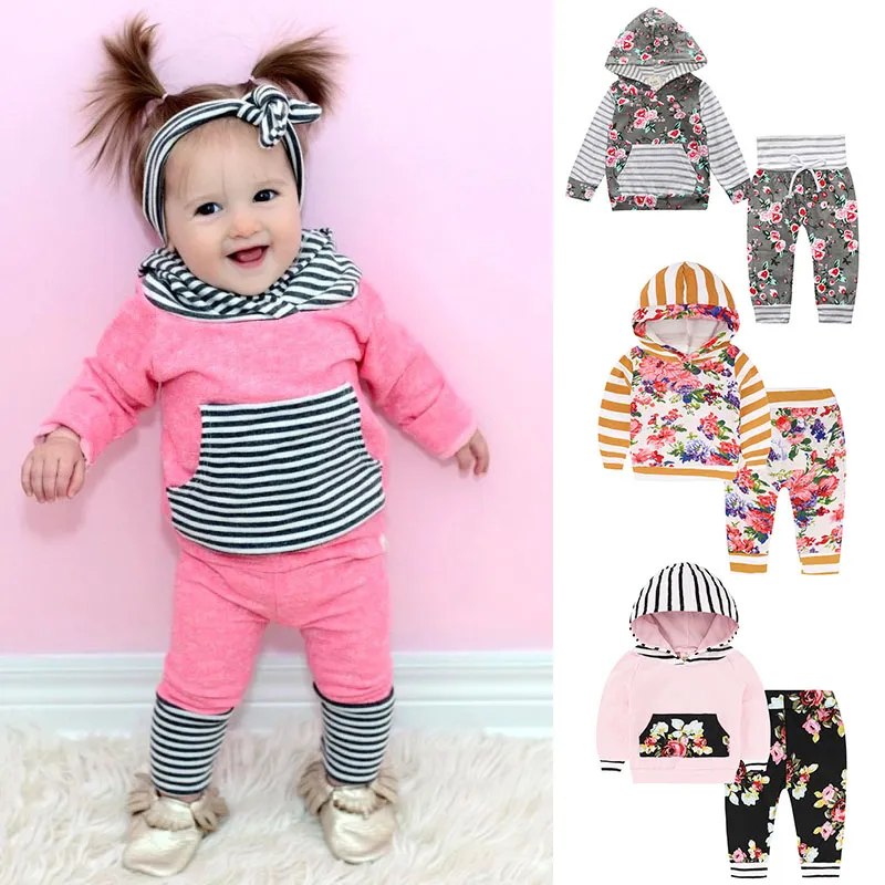 12 stilar baby tracksuit ins barn hoodie + byxor kläder uppsättning blommig randig print outfits outwear boy girls baby set barn kläder m685