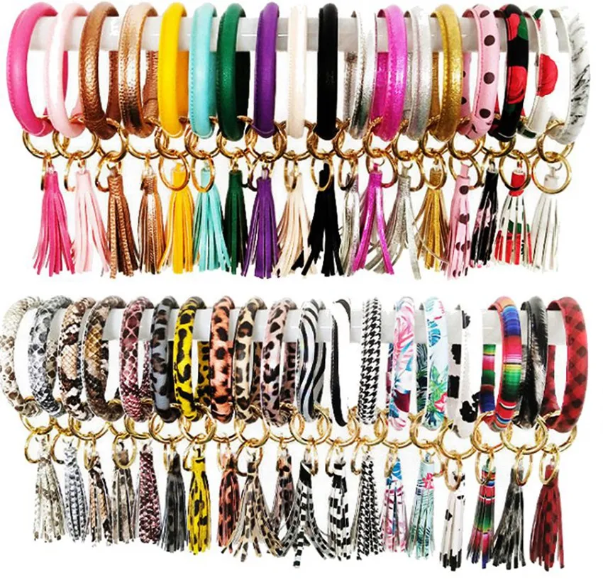 40 estilos Leopard pulseira de couro Chaveiro PU Wrist Redonda Tassel Pingente pulseiras keychain floral pulseira favor de partido KKA7935