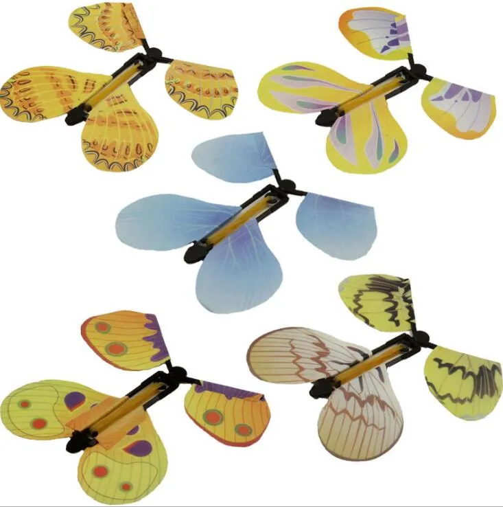 Magic Butterfly Fliegen in der Buchfee Rubber Band Powered Wind Up Butterfly Toy Großes Überraschungsgeschenk