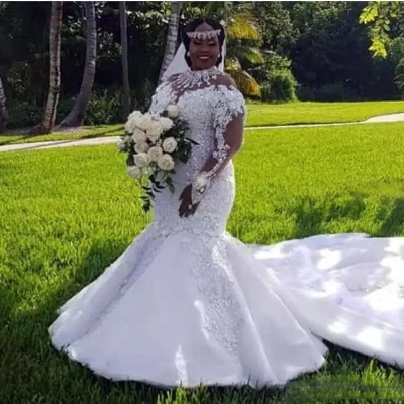 Abiti da sposa africani taglie forti Applicazioni in pizzo Maniche lunghe trasparenti Abito da sposa a sirena Sweep Train Abiti da sposa vintage Abiti