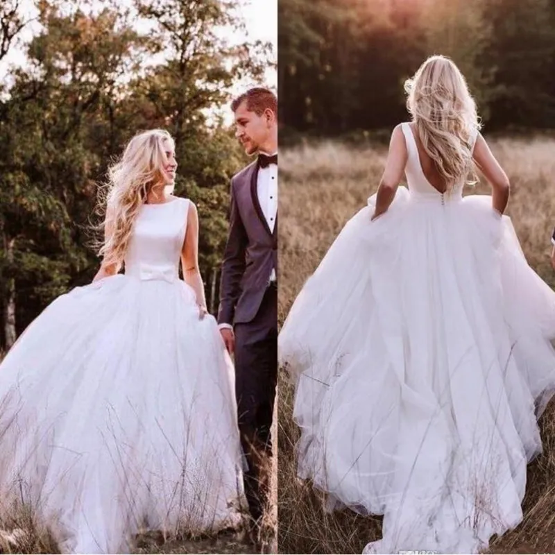 Abiti da sposa economici a trapezio in raso country occidentale 2022 Abito da sposa semplice con gonna in tulle senza schienale semplice bohémien Plus Size con fiocco robe de mariage