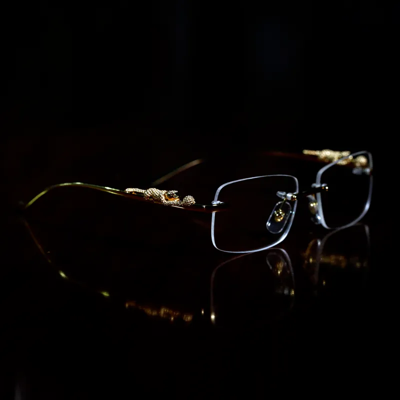 Diseñador de lujo gafas de sol gafas Marcos Templos con cabezas de pantera Metal sin marco de borde Full Semilessless Forma rectangular para hombres Mujer Eyewear Accesorios