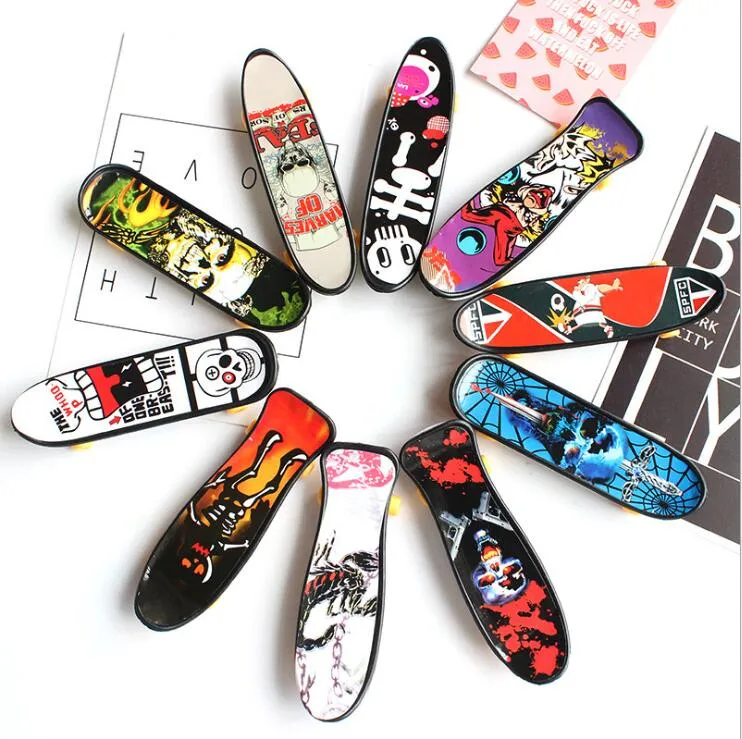 Mini planches à roulettes Skate camion Imprimer support en plastique professionnel FingerBoard Skateboard Finger Skateboard pour enfant jouet enfants cadeau