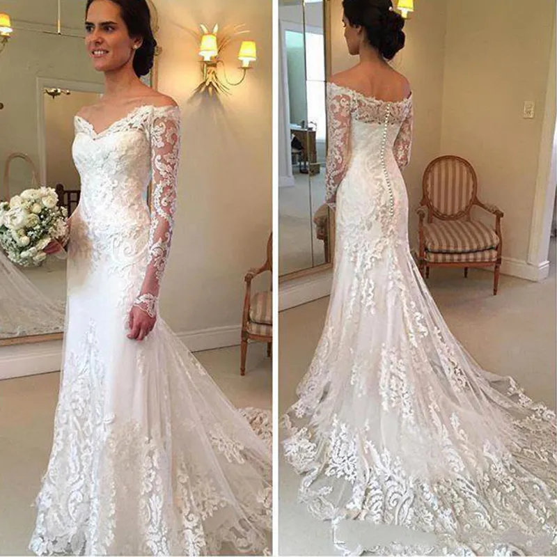 2020 Nuovi abiti da sposa vintage a sirena in pizzo maniche lunghe trasparenti al largo delle spalle Appliques bottoni sul retro abito da sposa lungo treno senza schienale