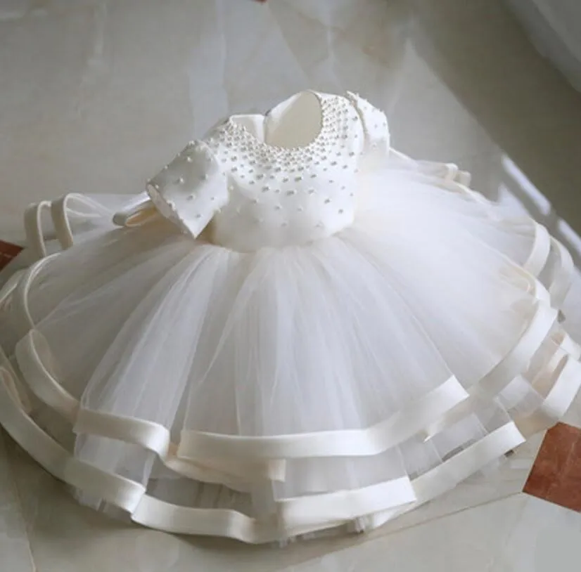 2019 Jewel Tulle och Satin Flower Girl Dresses A Line Te-längd Kids Girls Pageant Vintage First Communion Heliga Klänningar med Pärlor