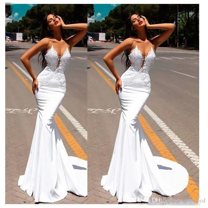 Sexy White Evening Gown with Sheer Neck Appliques and Beading Sequins Perfect for Prom Wedding and Other Formal Occasions