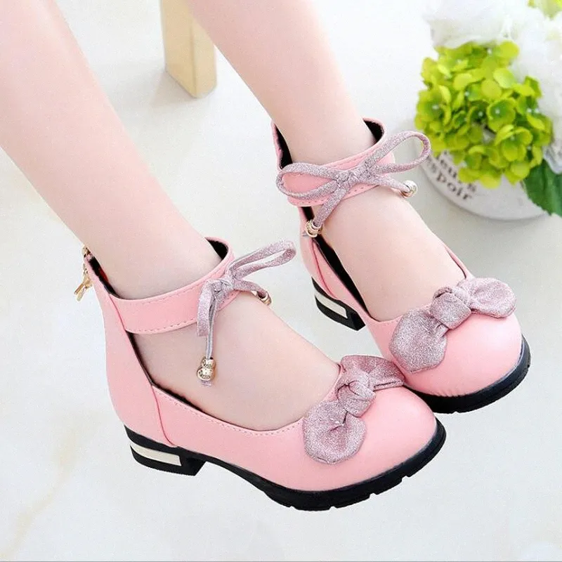 Compra Zapatos De Las Muchachas Niños PU Zapatos De Cuero Para Niños  Princesa Partido De Las Sandalias Niñas Niñas Tacones Altos De Piel De  Bowtie De La Danza Rosa Bebé Walkin Vank #
