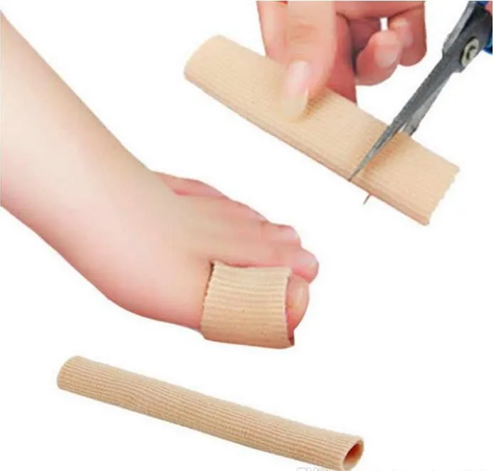 Pés Dedo Corrector Palmilhas Tecido gel de silicone tubo joanete Toes Fingers Separator Divisor Protector Calos calos navio livre