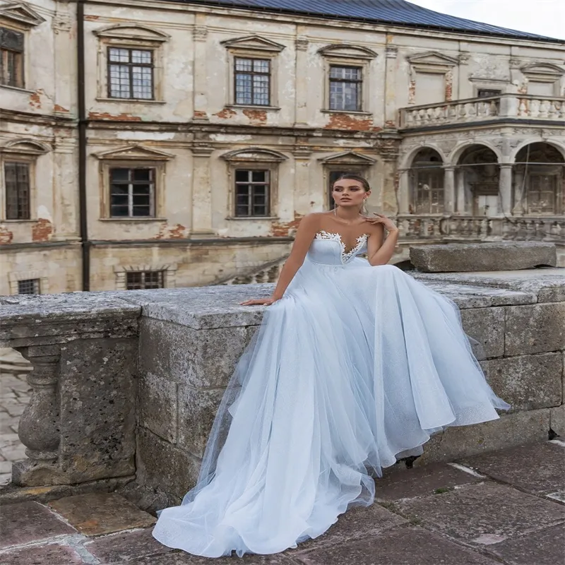 Custom-Made Backless Line A Wedding Dress with Bling Aline Embellishments, Sequins, and Sweep Train in Light Sky Blue Blending