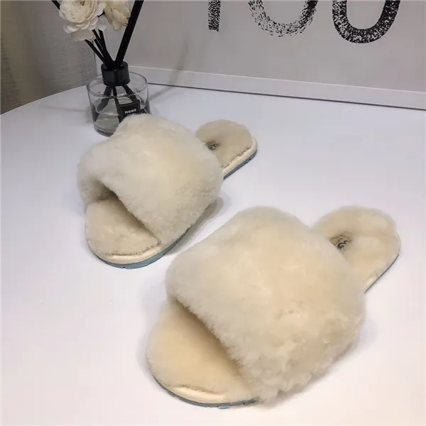 Fuzzalicious genuine shearling 2025 slipper