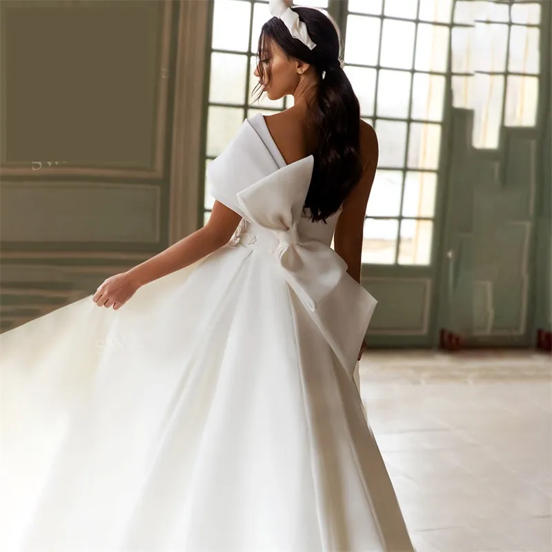 One Shoulder Ball Gown Wedding Dress With Bows And Front Slit