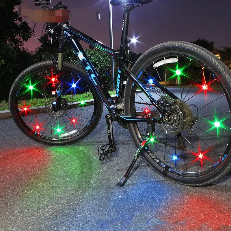 Luci per bici a led Lampada in filo d'acciaio Lampade a raggi brillanti Accessori per bici Bilanciere Ruota decorativa per fuoco a vento Design impermeabile 2 5yl D2