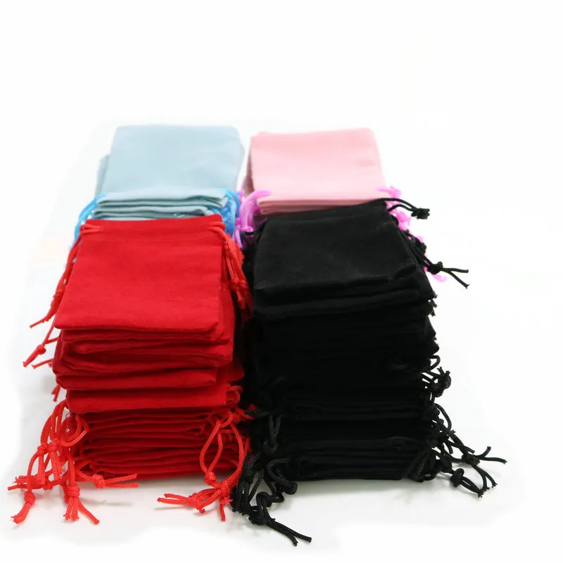 100 stks 5x7cm fluwelen trekkoord pouch tas / sieraden tas Kerstmis / bruiloft tassen zwart rood roze blauw 4 kleur groothandel