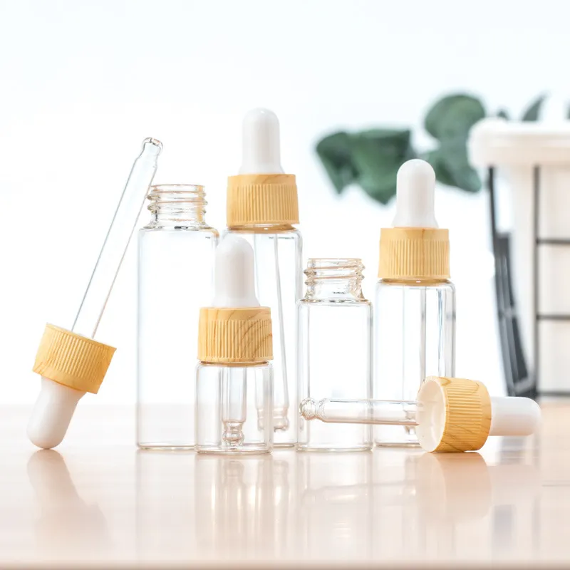 Flacon compte-gouttes de pipette de réactif liquide de bouteille de parfum d'huile essentielle en verre clair avec la couverture 5-20ml de grain en bois