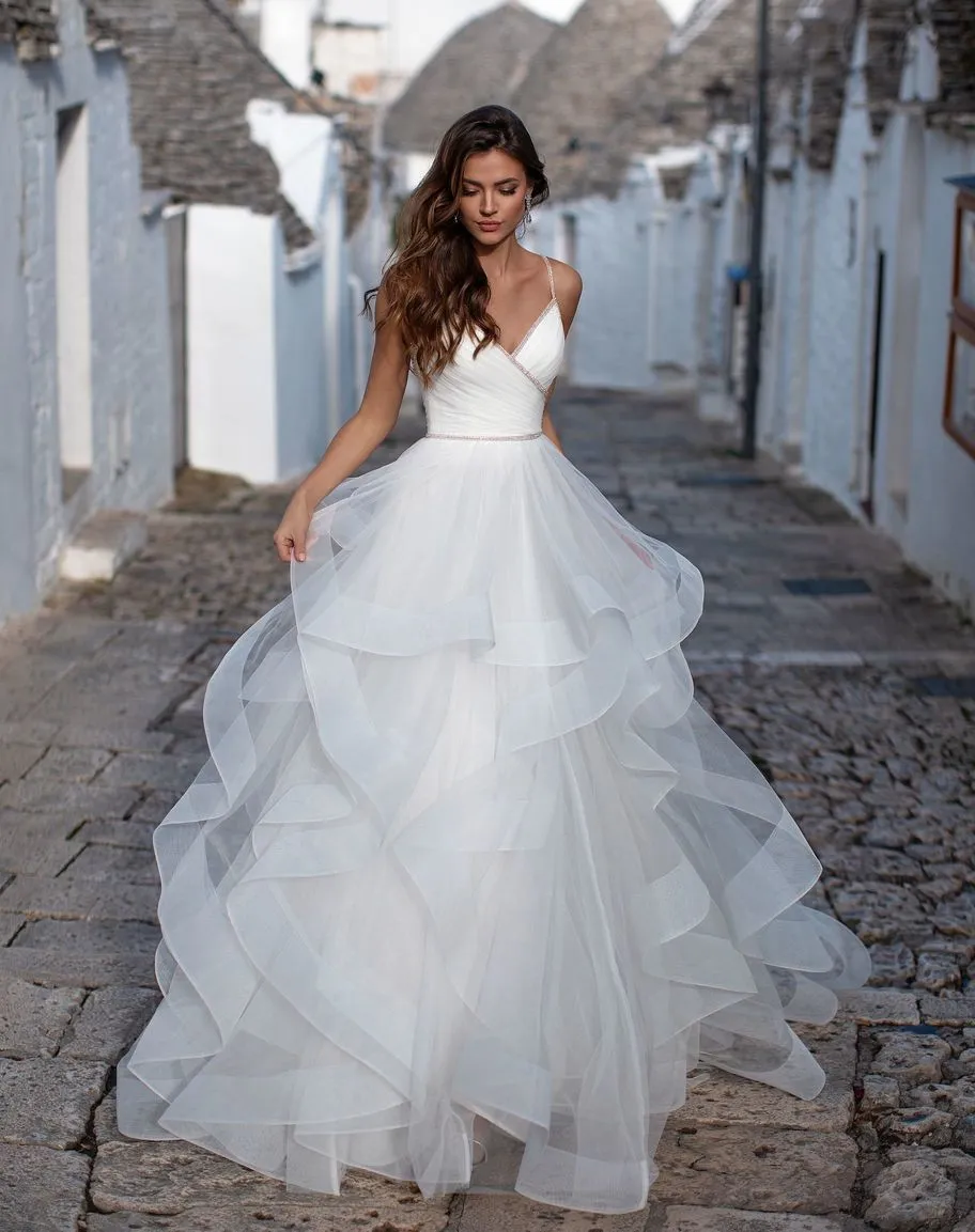 Delicate Beaded Ruffles A Line Wedding Dress with V-Neck and Spaghetti Straps, Backless and Elegant Details