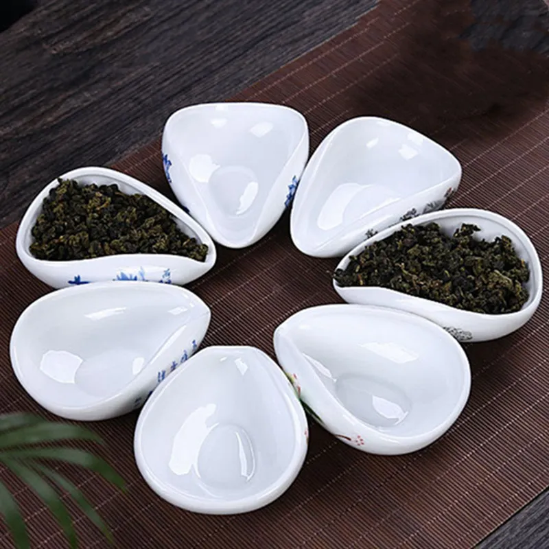 Biała ceramiczna herbata łyżka Piękna tradycyjna podkładka niebieska herbata gałka ceramiczna i łyżka herbaty Lotus liść