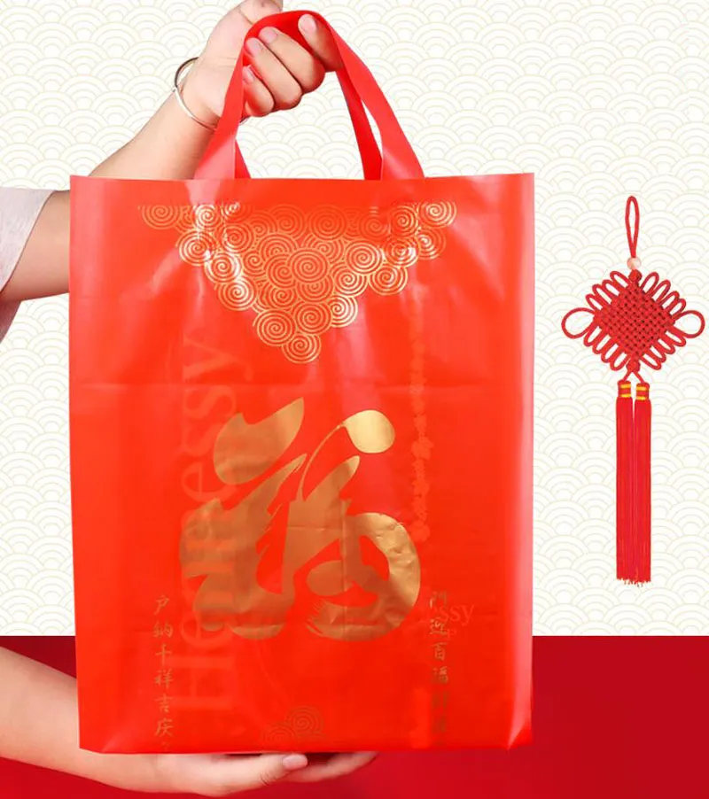 Sac en plastique rouge avec poignée, sacs cadeaux en papier pour cadeaux de fête de mariage, fournitures de pochette à vent chinoise, prix de gros de haute qualité