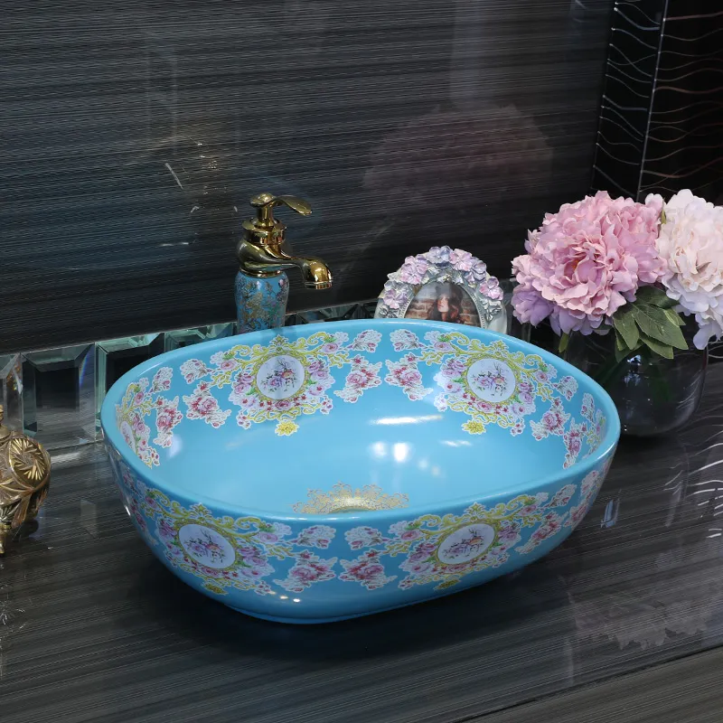楕円形のjingdezhenのバスルームセラミックシンク洗面台のカウンタートップウォッシュ洗面台のバスルームの流し楕円形の洗面所のシンクの青い色