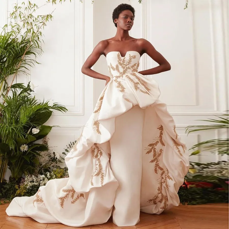 Stylish Beaded Overskirt Wedding Dress with Strapless Neckline, Applique Detailing, and Sweep Train - Sleeveless A-Line bridal gown in Satin - Robe de Stylish Beaded Overskirt Wedding Dress with Strapless Neckline, Applique Detailing, and Sweep Train - Sleeveless A-Line bridal gown in Satin - Robe de