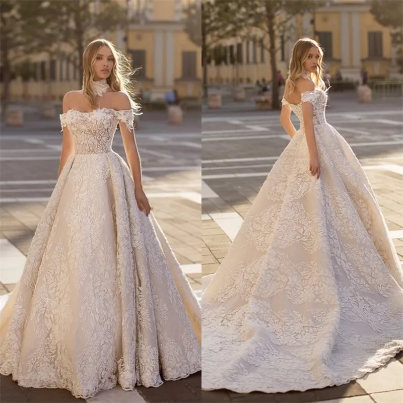 Sexy Bateau Nouvelle Marque Robes De Mariée Avec Col Haut Appliqued Dentelle Sans Manches Balayage Train Chapelle Robe De Mariée Sur Mesure Robes De Mari￩e