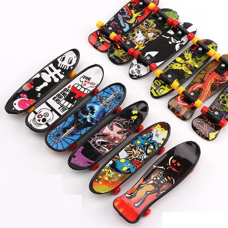 Mini Fingerboards Finger Skateboard Toy, Finger Skate Boarding Movimento creativo della punta delle dita Bomboniere Novità Giocattoli per la festa dei bambini