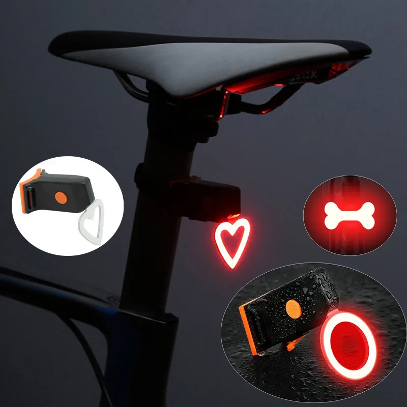 Luce per bici a LED a forma rotonda a forma di cuore Carica USB Luce posteriore per bicicletta Fanale posteriore MTB impermeabile Ciclismo Lampada di avvertimento di sicurezza notturna Luci per bici