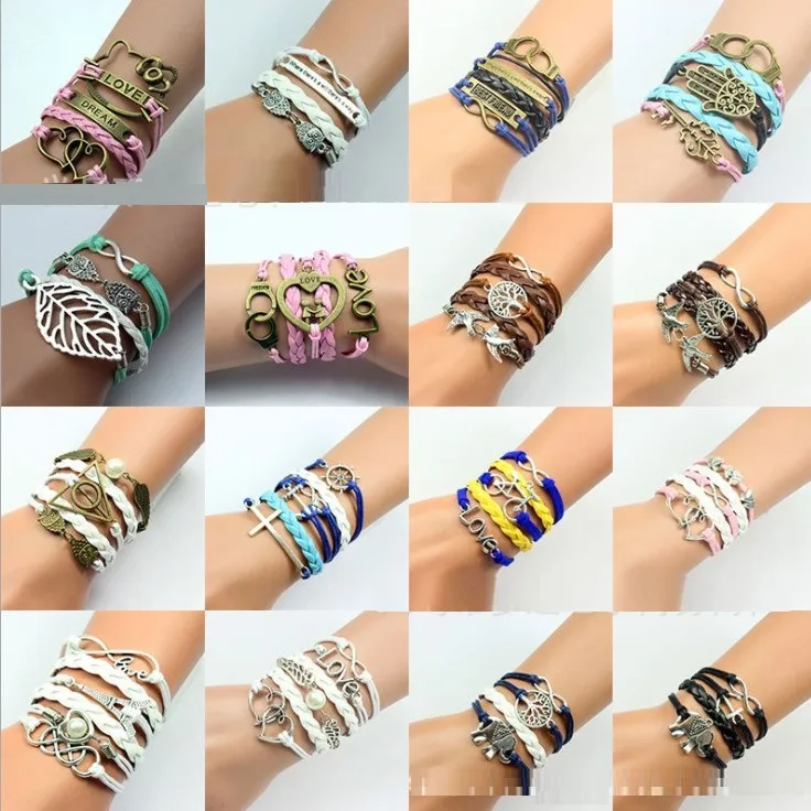 30pcs 283 disegni braccialetto di cuoio antico croce amore pesca cuore gufo uccello credere perla maglia braccialetti di fascino del bronzo