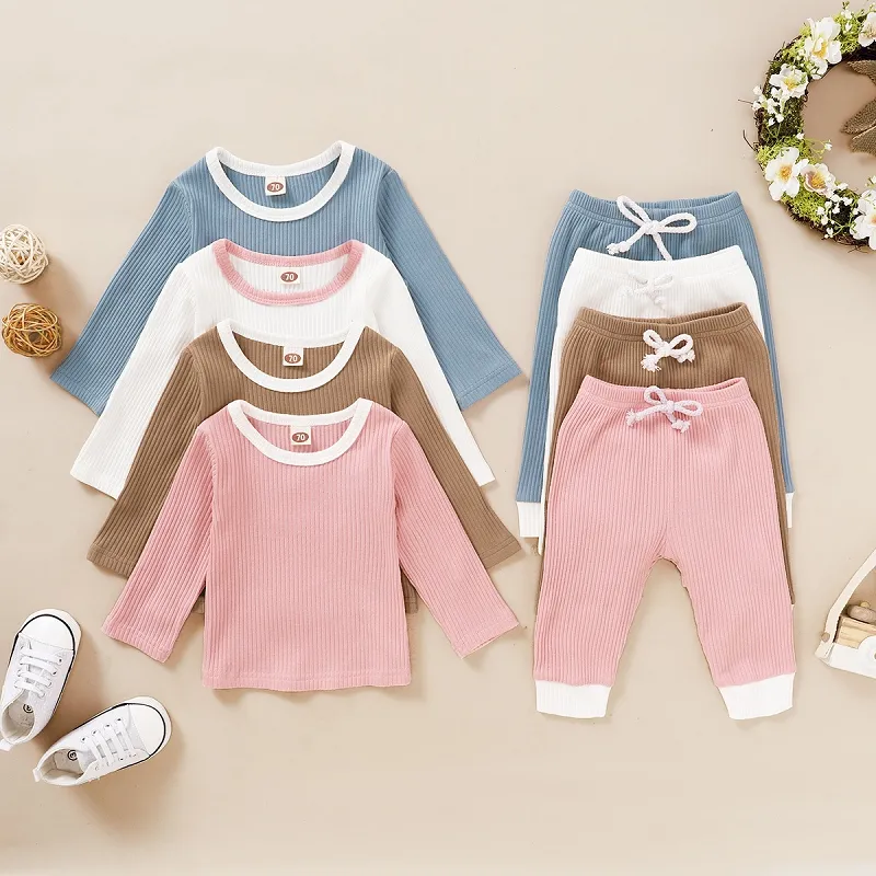 Autunno Bambini Pit Set di abbigliamento lavorato a maglia Ragazze T-shirt a maniche lunghe + Pantaloni 2 pezzi / set Vestiti di cotone morbido Boutique Neonati Abiti solidi M2646