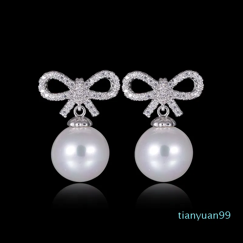 Hot Sale 925 Sterling Silver Örhängen Bow-knot Pearl Fashion Stud Örhängen Kristall Högkvalitativa Kvinnor Smycken Partihandel Billiga Pris